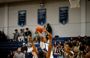 Myles Herbert: Elevating the Game Myles Herbert Sr Pt Guard taking jumpshot