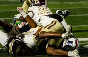 Summer Creek Bulldogs Dominate Manvel in Round 2 Playoffs Action shot of Summer Creek Bulldogs vs. Manvel Mavericks in Round 2 Texas high school football playoffs, captured by JCurtisMedia for GameDay Sports Journal