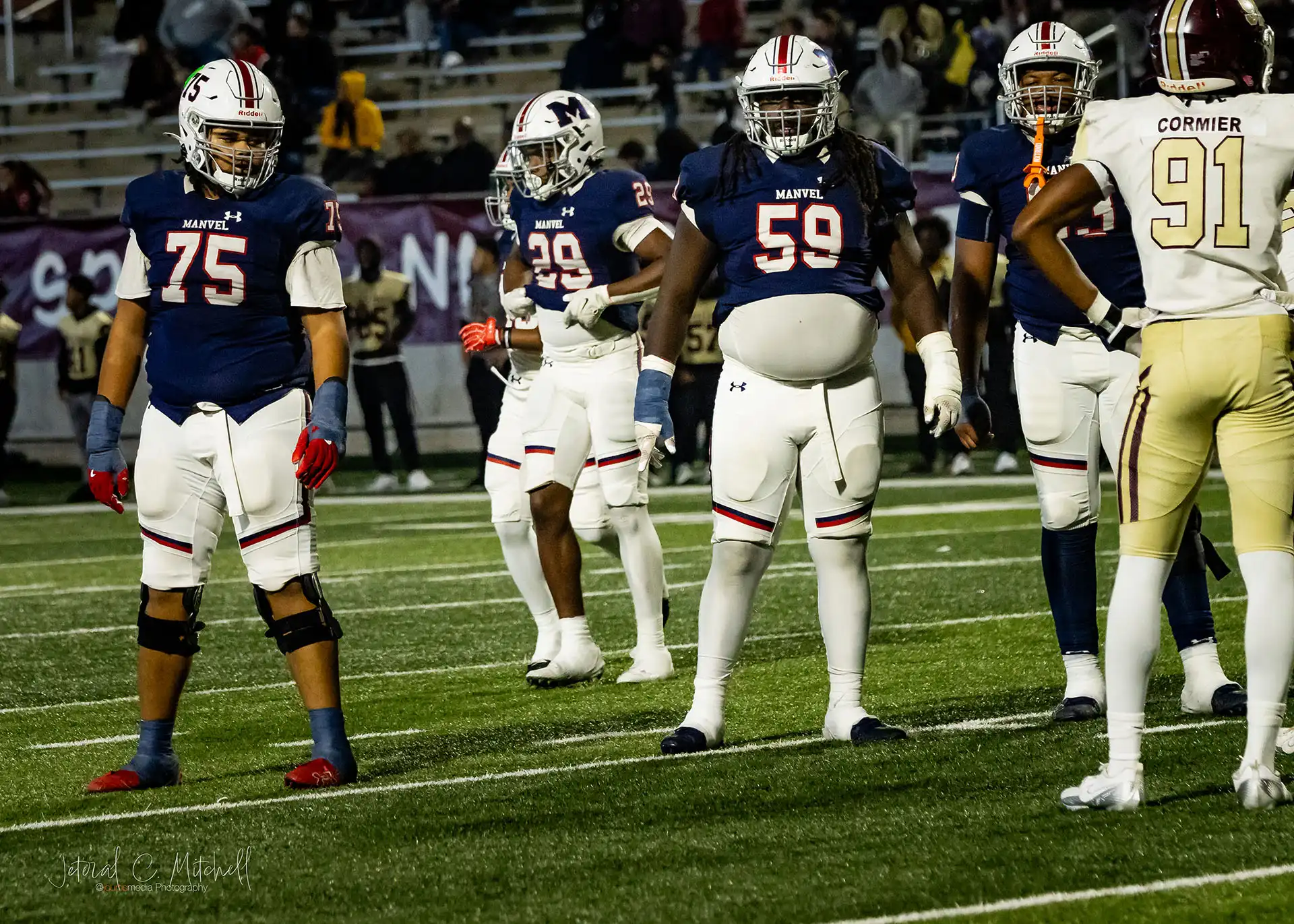 Action shot of Summer Creek Bulldogs vs. Manvel Mavericks in Round 2 Texas high school football playoffs, captured by JCurtisMedia for GameDay Sports Journal