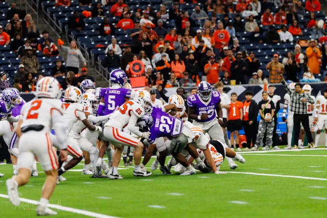 Game action from the Angleton Wildcats and La Porte Slicers playoff matchup, captured by JCurtisMedia for GameDaySportsJournal.com