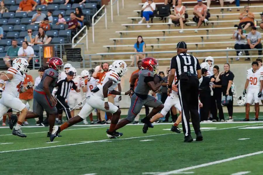 Manvel running back Xaiyden Brown carries the football against Alvin