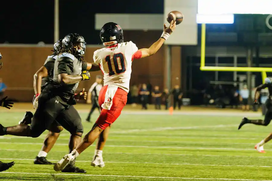 Dawson quarterback Aiden Raglin escapes Shadow Creek pressure