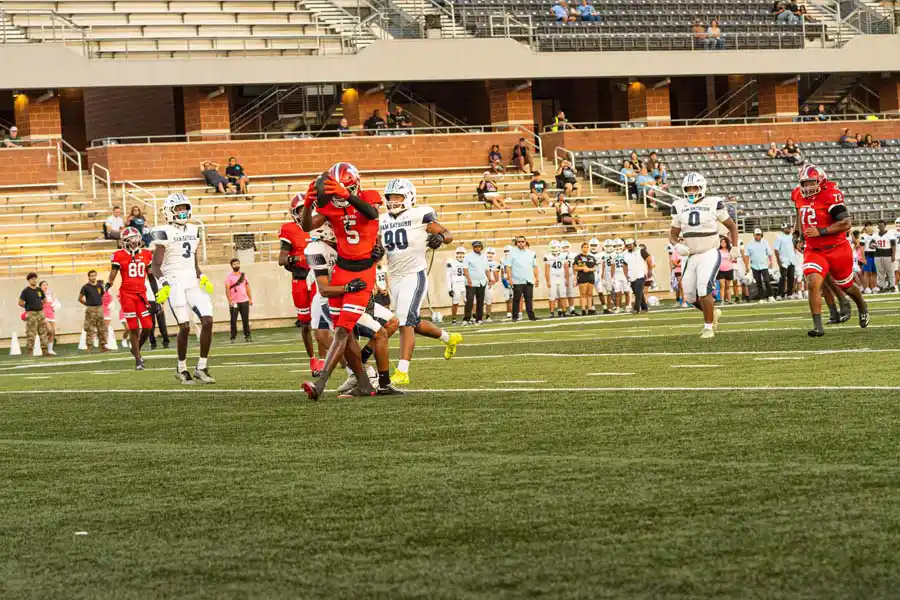 Manvel Mavericks number five carrying the football against Sam Rayburn