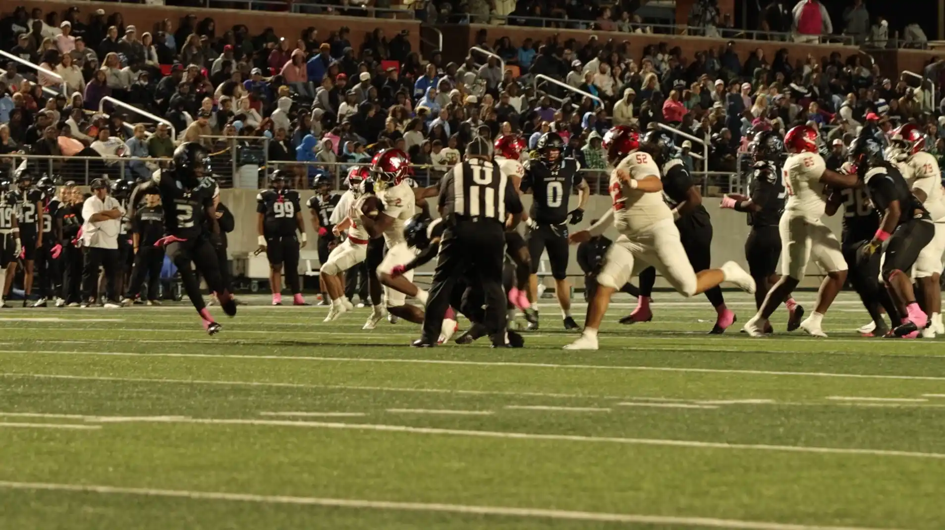 Shadow Creek’s defense meeting a Manvel rushing attempt.